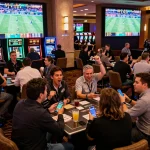 MM88 sports betting app showing live odds, with enthusiastic fans placing bets at an upscale casino